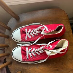 Converse Chuck Taylor All Star high top sneakers in classic red.